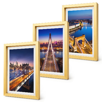 Juego de 3 cuadros decorativos Vistas nocturnas de ciudades con puentes y ríos.