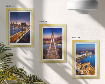 Juego de 3 cuadros decorativos Vistas nocturnas de ciudades con puentes y ríos.