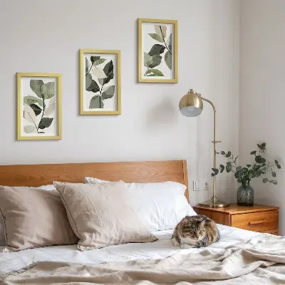 Tríptico de hojas de plantas estilo bohemio enmarcado con diseño delicado
