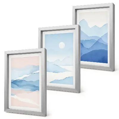 Tríptico de paisajes de montaña en acuarela en tonos azules y rosas enmarcado