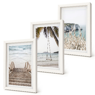 Juego de 3 cuadros decorativos Playa con escaleras de madera y columpio junto al mar.