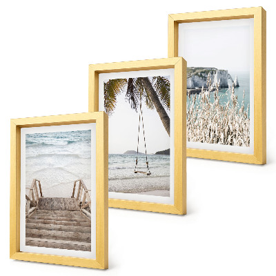 Juego de 3 cuadros decorativos Playa con escaleras de madera y columpio junto al mar.