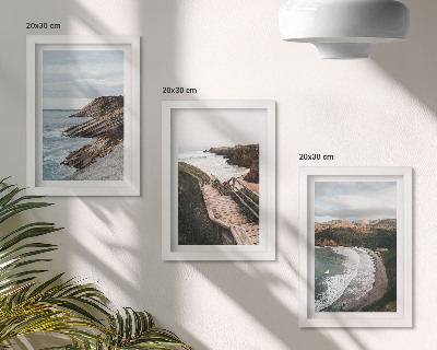 Juego de 3 cuadros decorativos Vistas costeras con acantilados y paisajes de playa.