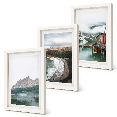 Juego de 3 cuadros decorativos Paisajes de montaña con una playa y una casa de madera.