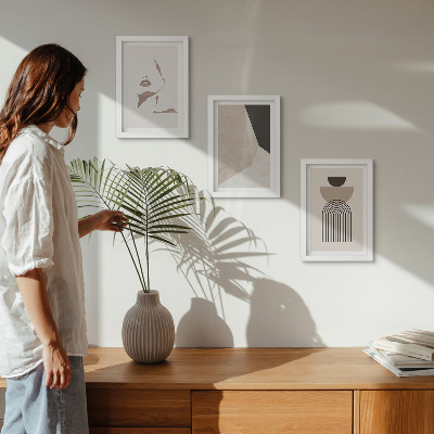 Juego de 3 cuadros decorativos Formas geométricas abstractas y el rostro de una mujer.