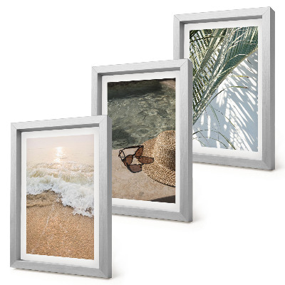 Juego de 3 cuadros decorativos Sombrero de playa y gafas de sol hojas