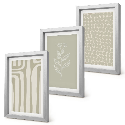 Tríptico enmarcado Diseños vegetales y geométricos en colores apagados.
