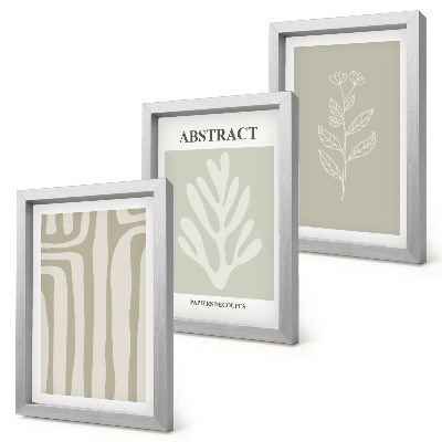 Tríptico enmarcado Diseños abstractos de plantas en colores apagados.
