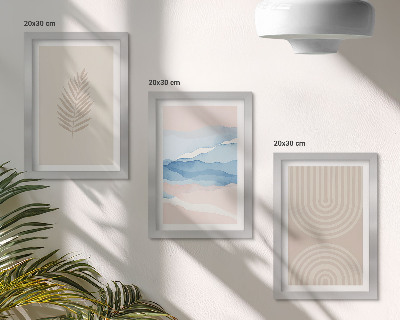 Juego de 3 cuadros decorativos Hojas y olas en tonos beige y azul.