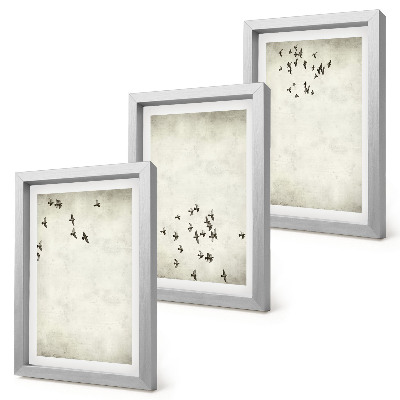 Tríptico enmarcado Una pintura minimalista de pájaros volando