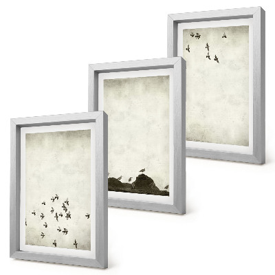 Tríptico enmarcado Pájaros en vuelo pintados al estilo minimalista.