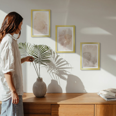 Juego de 3 cuadros decorativos Acuarelas cálidas sobre lienzo con texturas pastel.