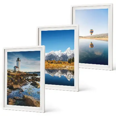 Set de 3 cuadros para salón con paisajes de naturaleza que incluyen un faro, montañas y un globo