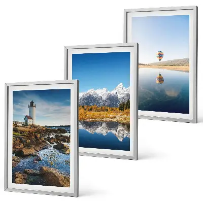 Set de 3 cuadros para salón con paisajes de naturaleza que incluyen un faro, montañas y un globo