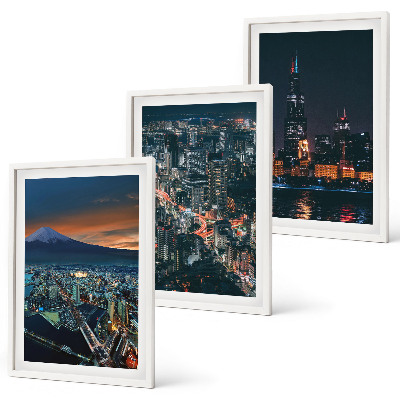 Set de 3 cuadros para salón Vista de la ciudad desde la montaña por la noche.