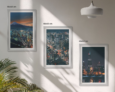 Set de 3 cuadros para salón Vista de la ciudad desde la montaña por la noche.