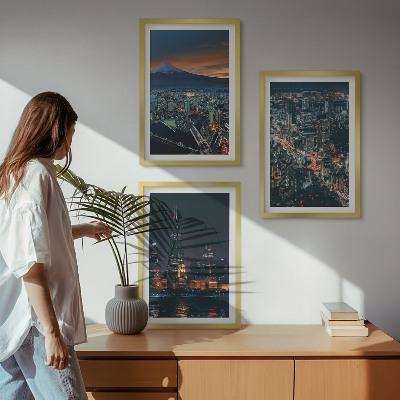 Set de 3 cuadros para salón Vista de la ciudad desde la montaña por la noche.