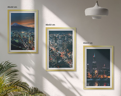 Set de 3 cuadros para salón Vista de la ciudad desde la montaña por la noche.