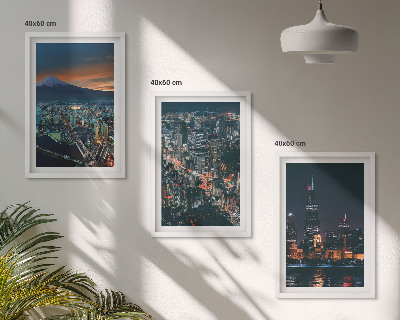 Set de 3 cuadros para salón Vista de la ciudad desde la montaña por la noche.