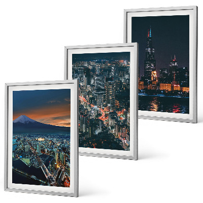 Set de 3 cuadros para salón Vista de la ciudad desde la montaña por la noche.