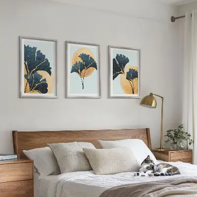 Juego de 3 cuadros con diseño de hojas de ginkgo sobre fondo claro