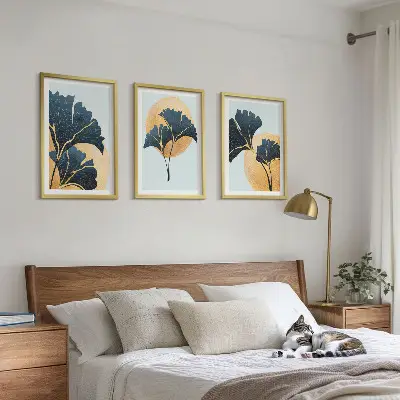 Juego de 3 cuadros con diseño de hojas de ginkgo sobre fondo claro