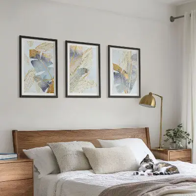 Juego de 3 cuadros con diseño de hojas en tonos azul claro y beige