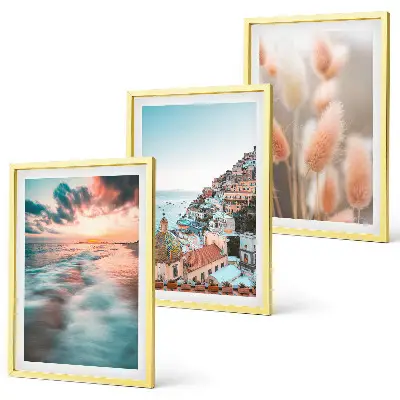 Juego de 3 cuadros de casas con flores al atardecer en el mar