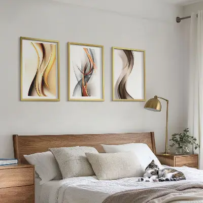 Juego de 3 cuadros con diseño de ondas en tonos amarillo y gris amarronado