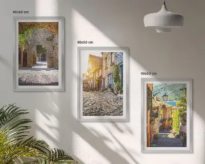 Juego de 3 cuadros con diseño de encantadoras calles empedradas