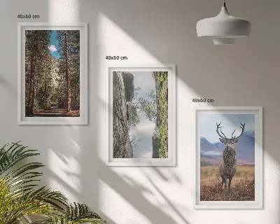Set de 3 cuadros para salón con diseño de carretera entre bosque, montañas y ciervo