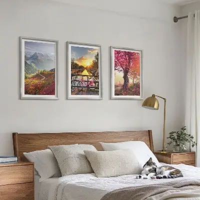 Set de 3 cuadros para salón con diseño de paisajes de montaña en bicicleta