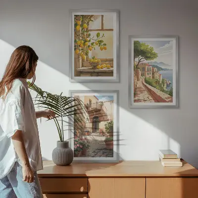 Set de 3 cuadros para salón con motivos de frutas cítricas en una cocina de ciudad costera