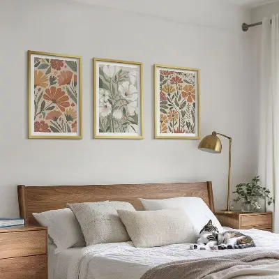 Set de 3 cuadros para salón con estampados florales en naranja y verde