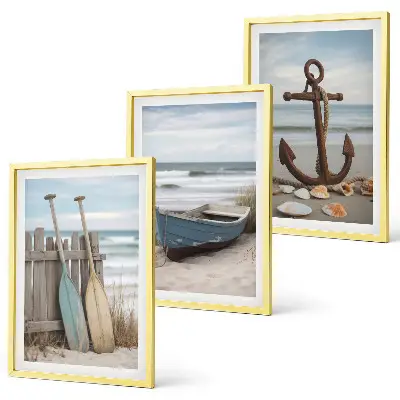 Set de 3 cuadros para salón con diseño de ancla en la arena de playa
