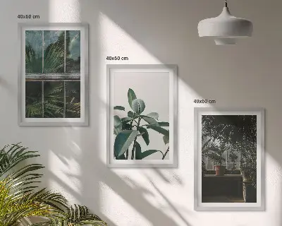 Set de 3 cuadros para salón con diseño de hojas verdes en planta de ventana