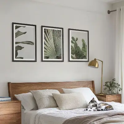 Juego de 3 cuadros con diseño de hojas de plantas tropicales en tonos pastel