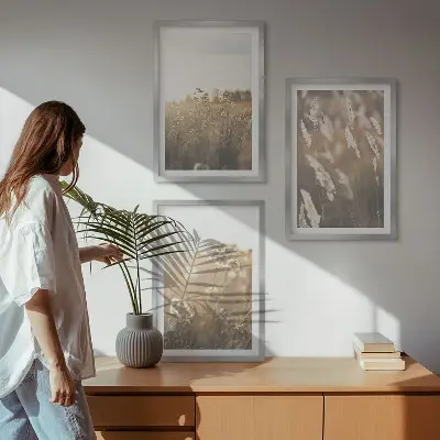 Juego de 3 cuadros con diseño de flores en paisaje cálido