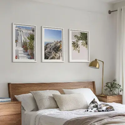 Set de 3 cuadros decorativos para salón con diseño de escaleras blancas y vistas a Santorini