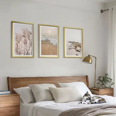 Set de 3 cuadros para salón con diseño boho de hierba de playa, olas y piedras