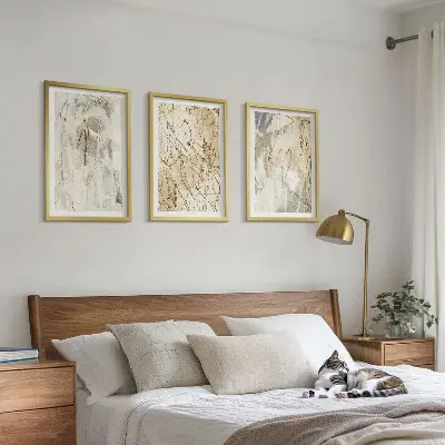 Set de 3 cuadros para salón con estampados abstractos en tonos beige y gris