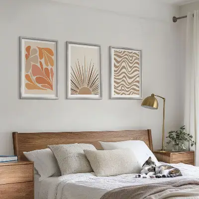 Juego de 3 cuadros con diseño bohemio de formas solares en tonos pastel