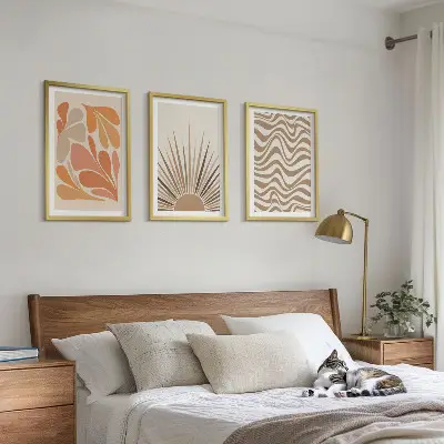 Juego de 3 cuadros con diseño bohemio de formas solares en tonos pastel