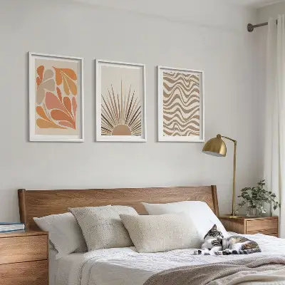 Juego de 3 cuadros con diseño bohemio de formas solares en tonos pastel