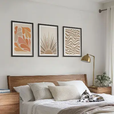 Juego de 3 cuadros con diseño bohemio de formas solares en tonos pastel