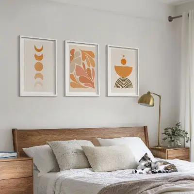 Set de 3 cuadros para salón con diseño de formas abstractas en color naranja