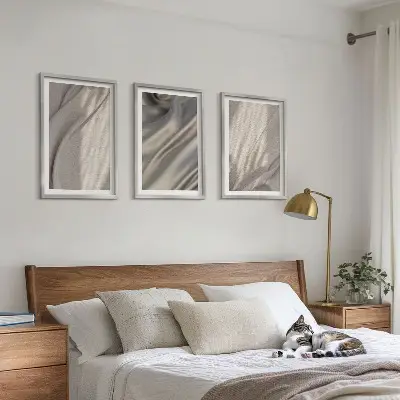 Juego de 3 cuadros con telas bohemias naturales en primer plano