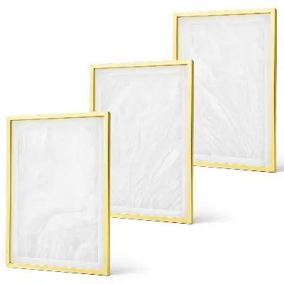 Set de 3 cuadros para salón con elegante estructura de mármol