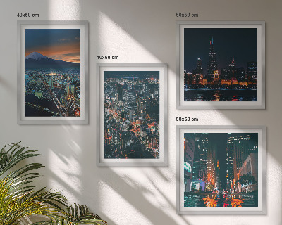 Set de 4 cuadros para salón Vista de la ciudad desde la montaña por la noche.