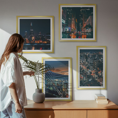 Set de 4 cuadros para salón Vista de la ciudad desde la montaña por la noche.
